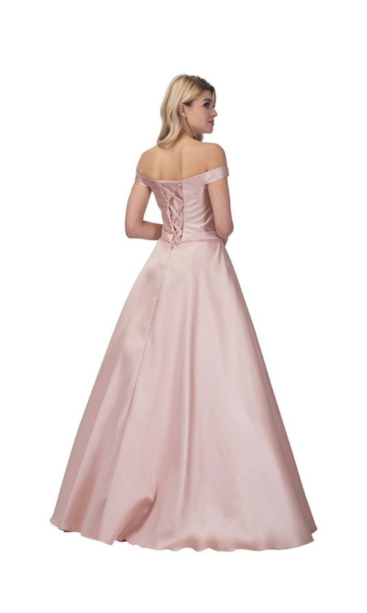 A woman poses against a white background in the Lace-Up Long Prom Ball Gown: Chicas C7074, a floor-length pink satin off-the-shoulder dress with a lace-up back.